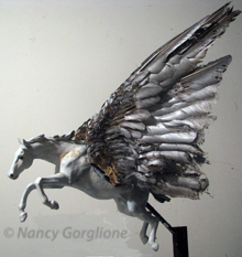 Pegasus Model in bees wax, feathers, paint and metal armature by nancy Gorglione